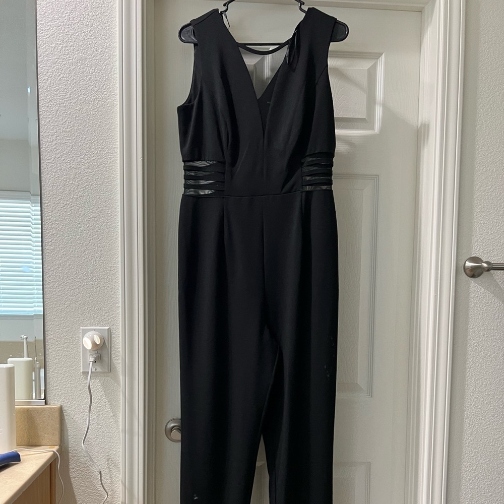 Black jumpsuit with mesh details